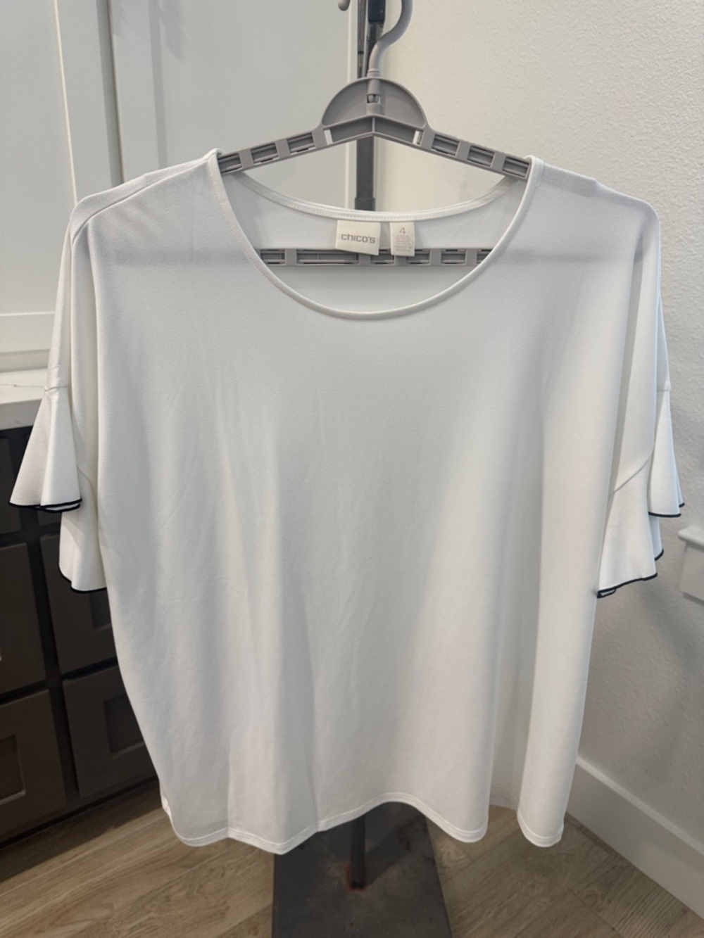 Chico's White Short Sleeve Scoop Neck Top with Ruffle Trim with black edges NWOT